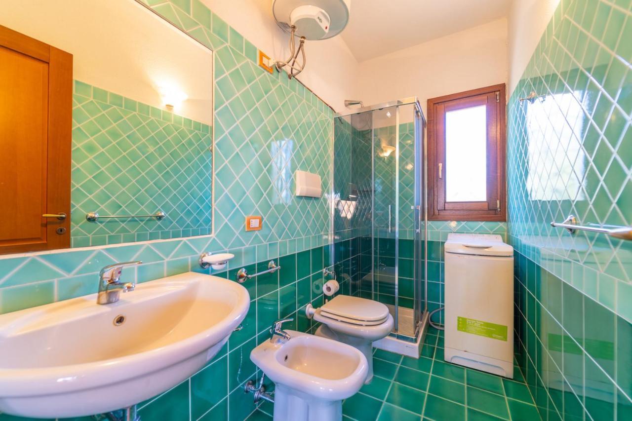 Aparthotel Il Faro San Teodoro Esterno foto