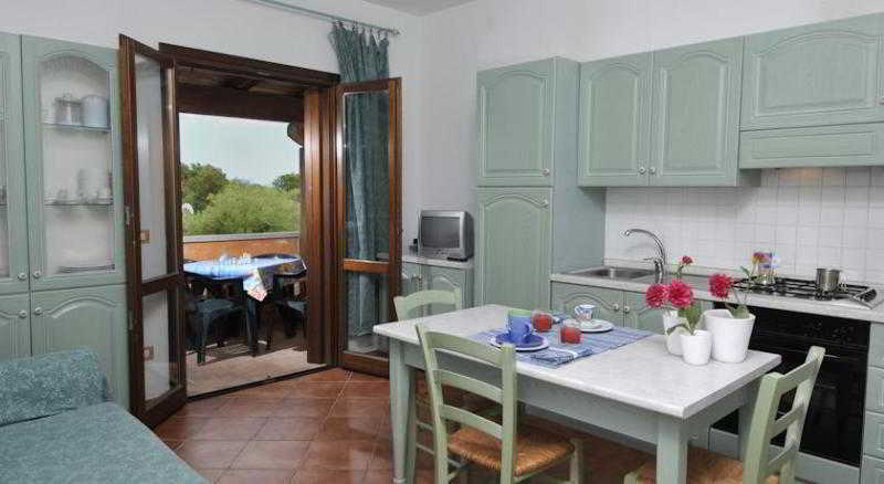 Aparthotel Il Faro San Teodoro Esterno foto